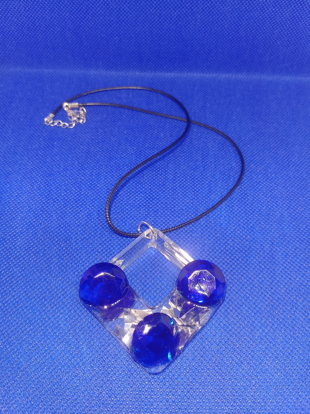 Clear Geometric Pendant Necklace with Cobalt Blue Accents